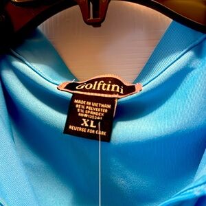 Selling brand new Women’s golf top. Brand is Golftini size XL. Never been worn